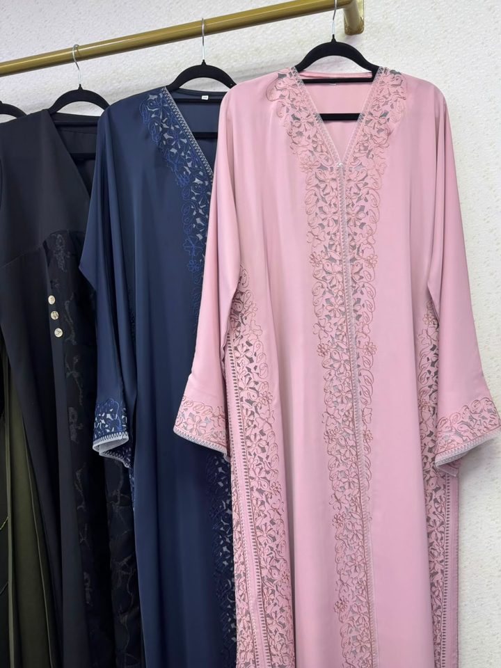 Pink and navy abayas with lace panels