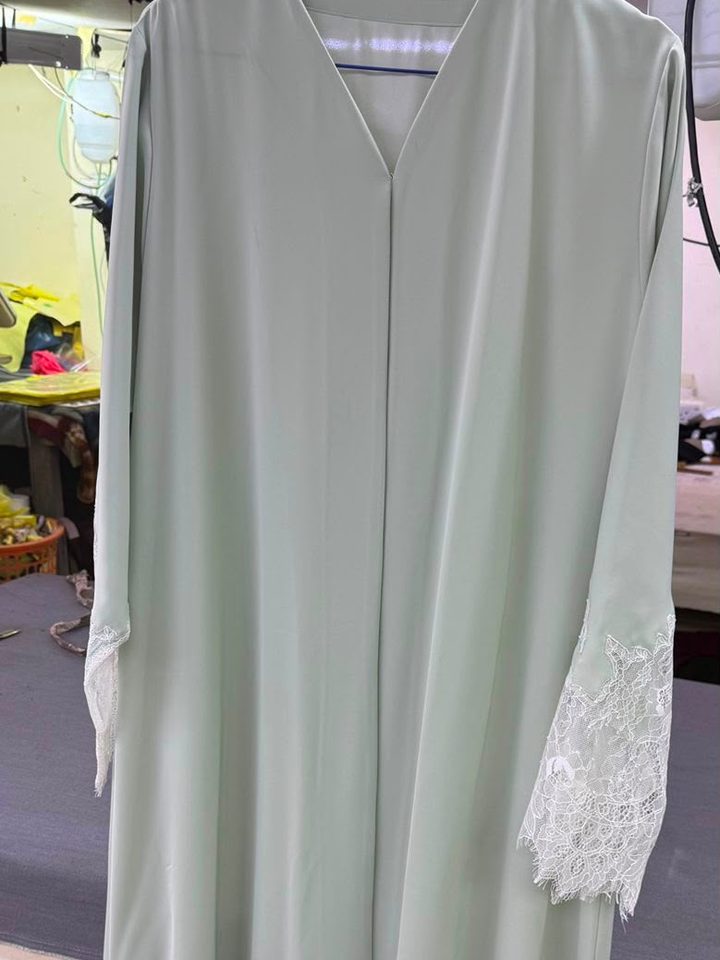 Sage abaya with lace cuffs and hem